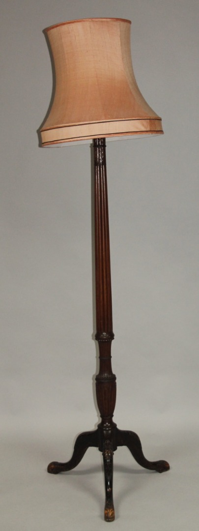 Appraisal: A thC mahogany lamp standard the acanthus topped fluted stem