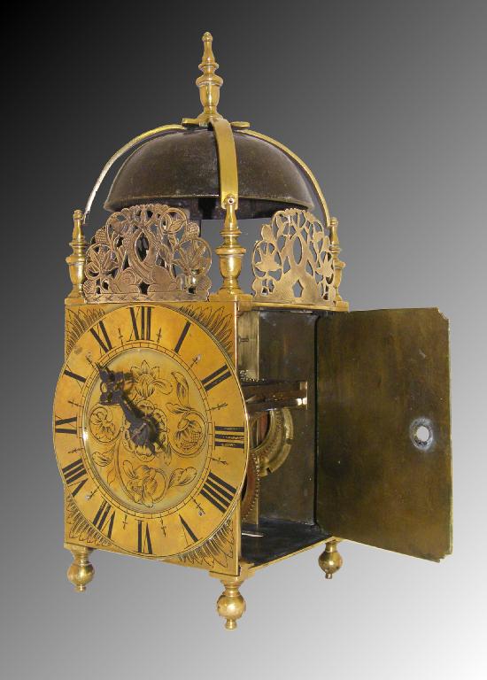 Appraisal: Brass lantern clock the chapter ring enclosing a stylised floral