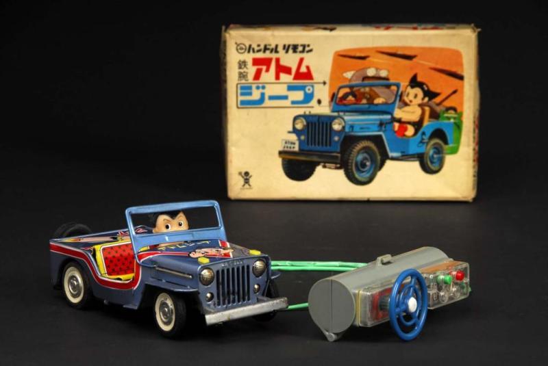 Appraisal: Astro Boy Jeep Toy Description Japanese Made by Bandai Working