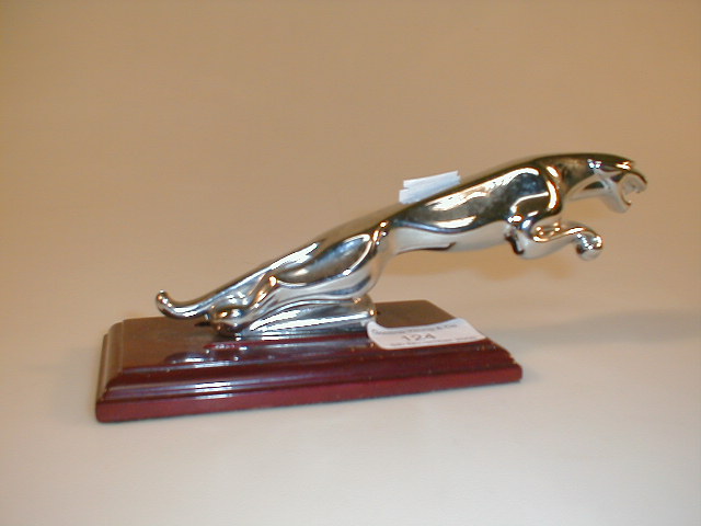 Appraisal: A chrome Jaguar car mascot mounted on plinth