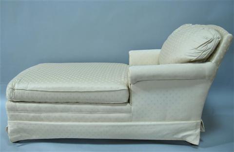 Appraisal: MODERN WHITE UPHOLSTERED CHAISE LOUNGE th century the loose t-shaped