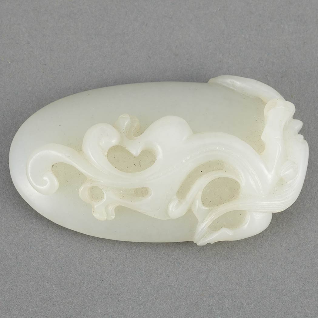 Appraisal: Chinese White Jade Pendant Of ovoid shape carved in high