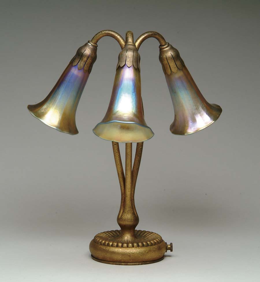 Appraisal: TIFFANY THREE LITE LILY Wonderful Tiffany lily lamp has gold