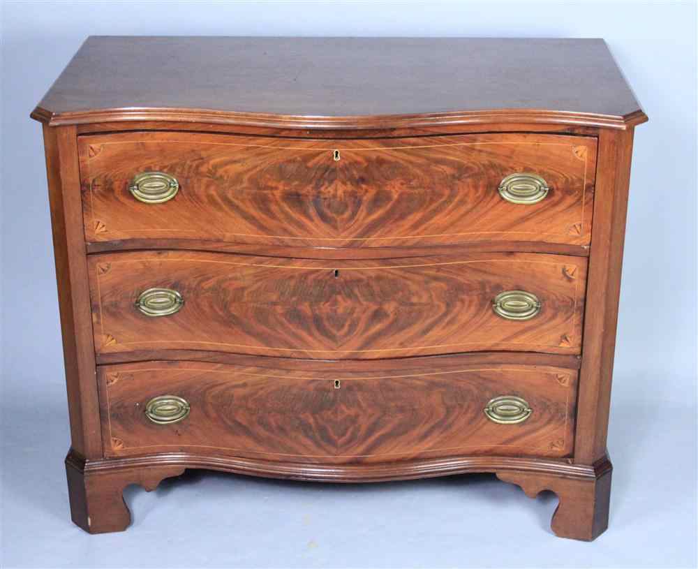 Appraisal: GEORGE III INLAID MAHOGANY SERPENTINE CHEST OF DRAWERS the serpentine