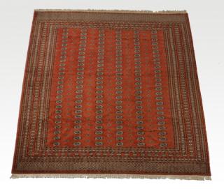 Appraisal: Hand knotted Pakistani Bokhara wool carpet x Hand knotted Pakistani