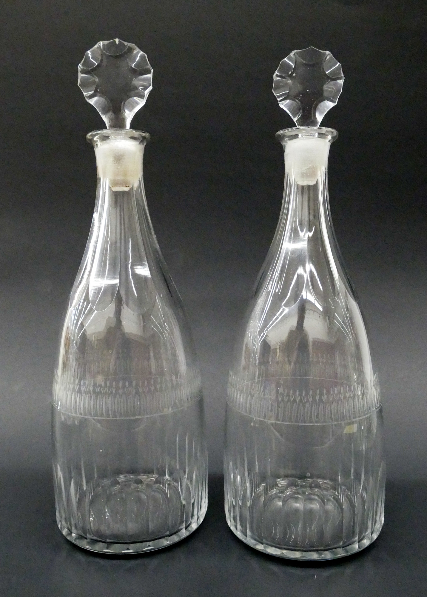 Appraisal: Pair Georgian Tulip Motif Small Crystal Decanters c Panel cut