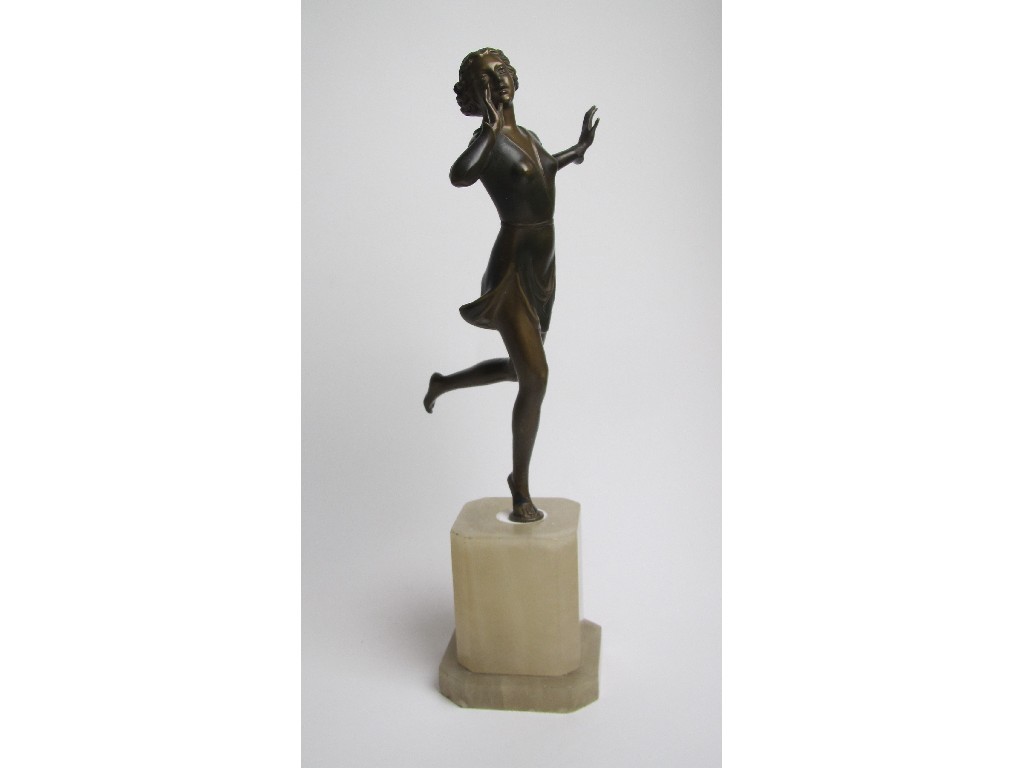 Appraisal: An Art Deco painted spelter figure of a young woman