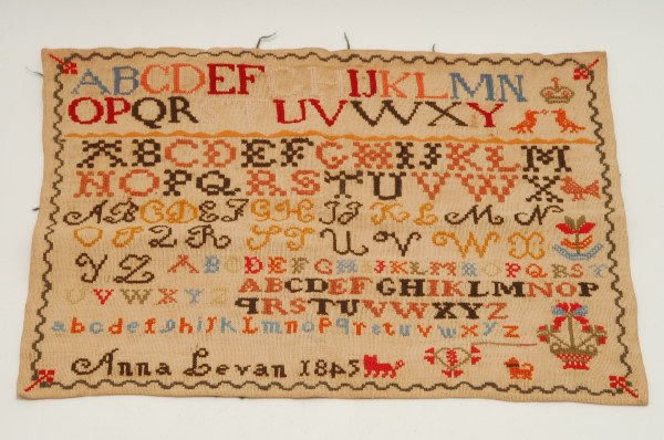 Appraisal: Needlework marking sampler Features six versions of the alphabet in