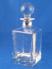 Appraisal: A silver mounted clear glass whisky decanter Birmingham