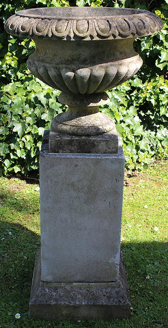 Appraisal: A HADDONSTONE URN of shallow form with egg and dart