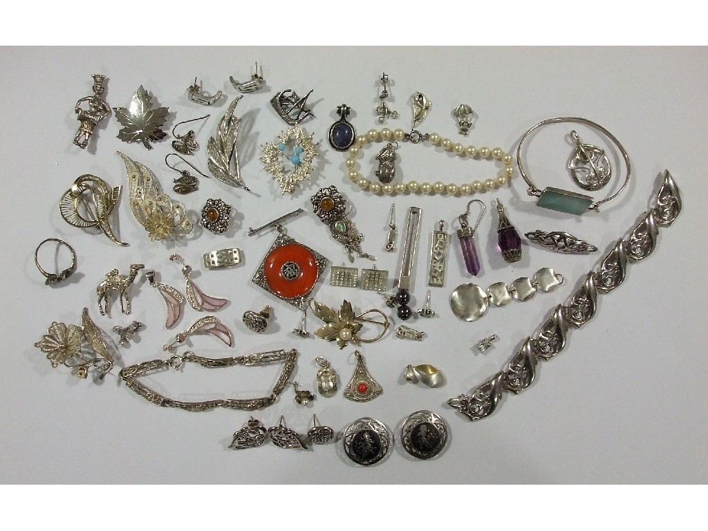 Appraisal: Lot of silver pieces to include brooches earrings Siamese earrings