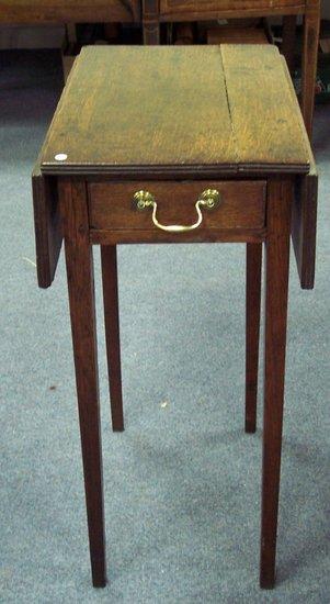 Appraisal: A th Century two-flap table fitted a drawer to one