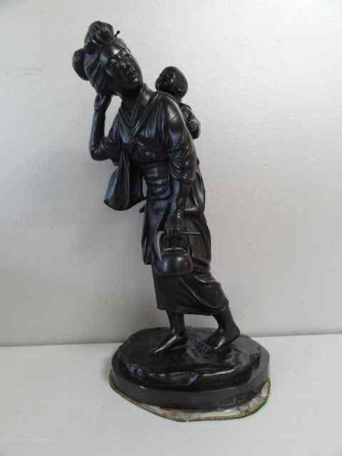 Appraisal: Signed Asian Bronze of Woman and Child A nice quality