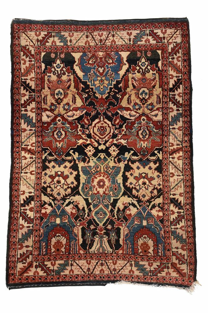 Appraisal: Kazak Rug th century black field with oversized palmette and