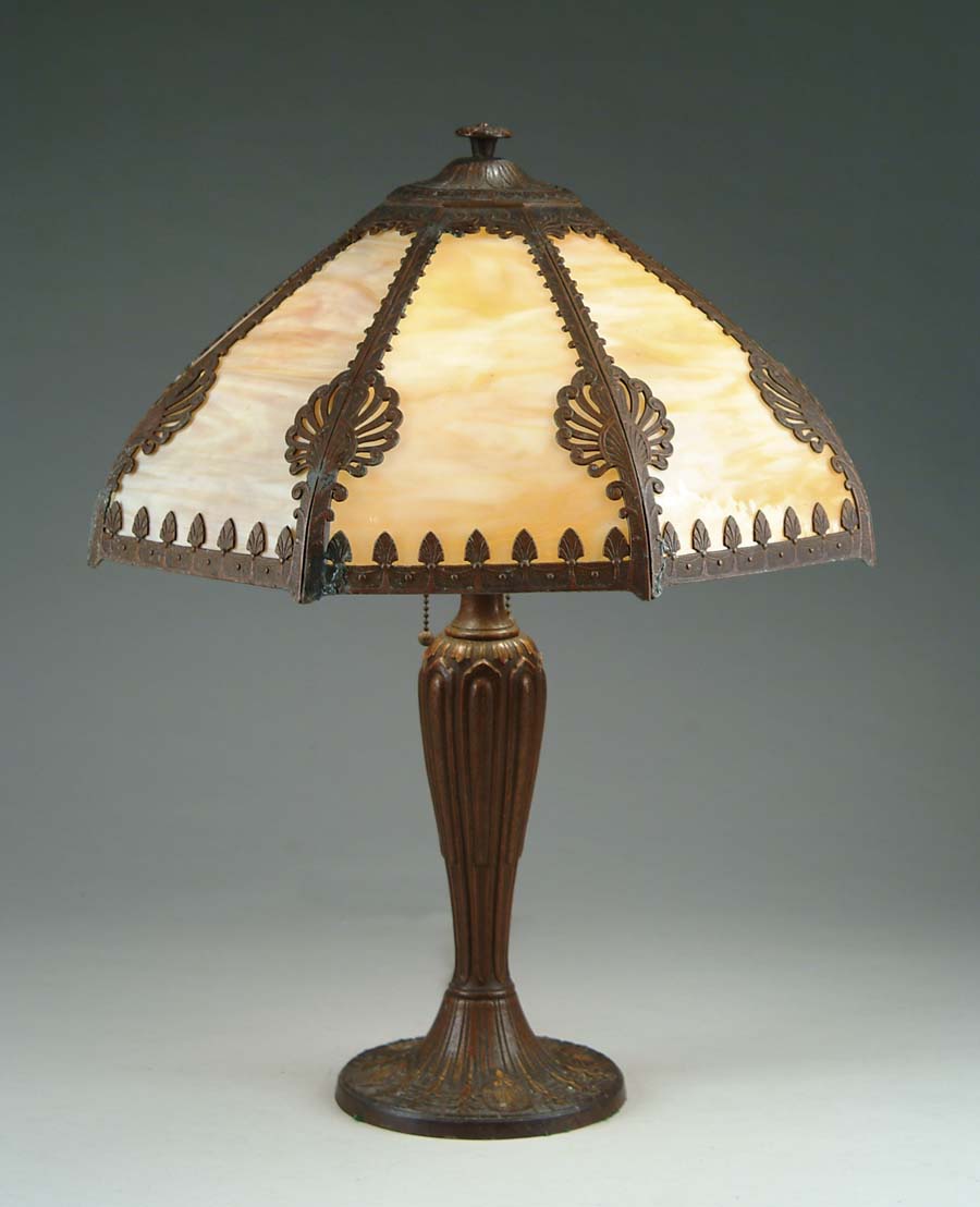 Appraisal: BENT PANEL TABLE LAMP Copper toned table lamp has eight