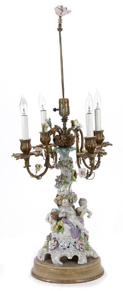 Appraisal: A Continental porcelain and gilt metal table lamp height to