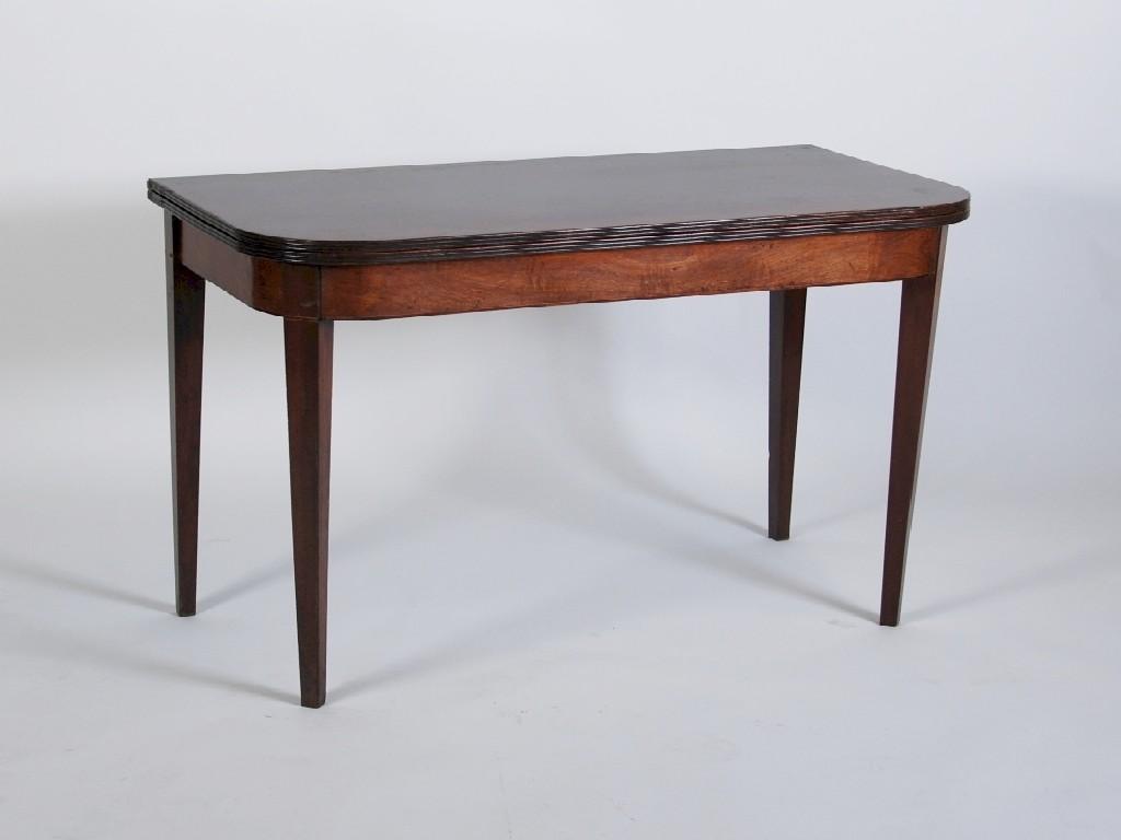 Appraisal: NINETEENTH CENTURY FIGURED MAHOGANY TEA TABLE the moulded oblong top