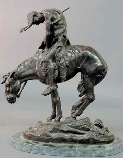 Appraisal: Bronze of an American Indian brave on horseback signed after