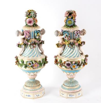 Appraisal: A pair of late th Century Continental vases and covers