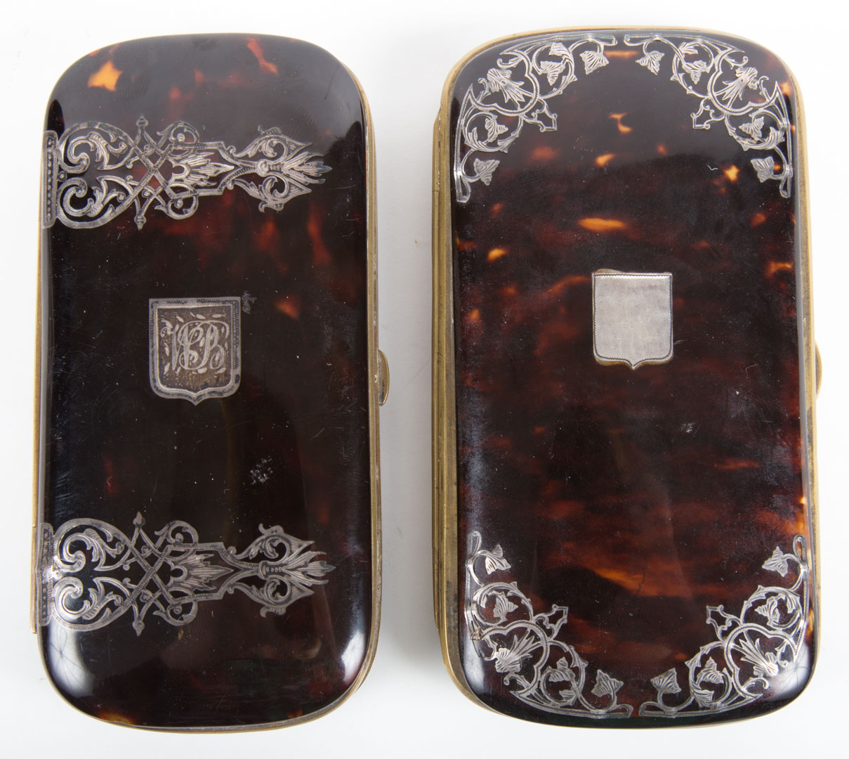 Appraisal: Two Victorian silver inlaid eyeglass cases mid th-century each with