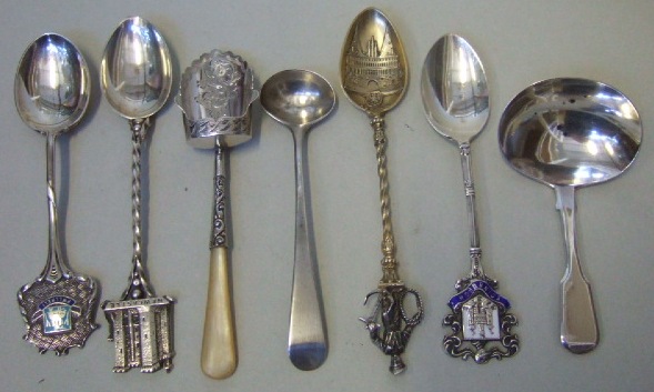 Appraisal: A silver caddy spoon of shovel form with scrolling decoration