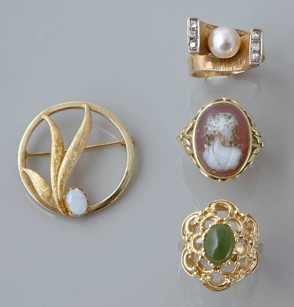 Appraisal: A collection gem-set and gold rings and brooch grams gross