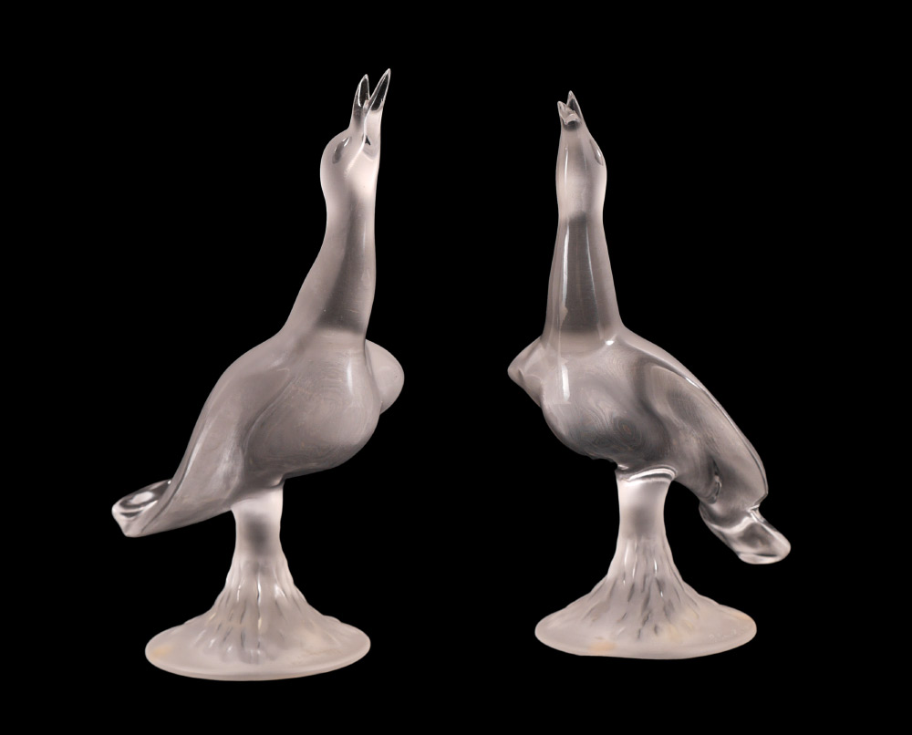 Appraisal: LALIQUE CRYSTAL PAIR OF BIRDS Two frosted crystal bird figures