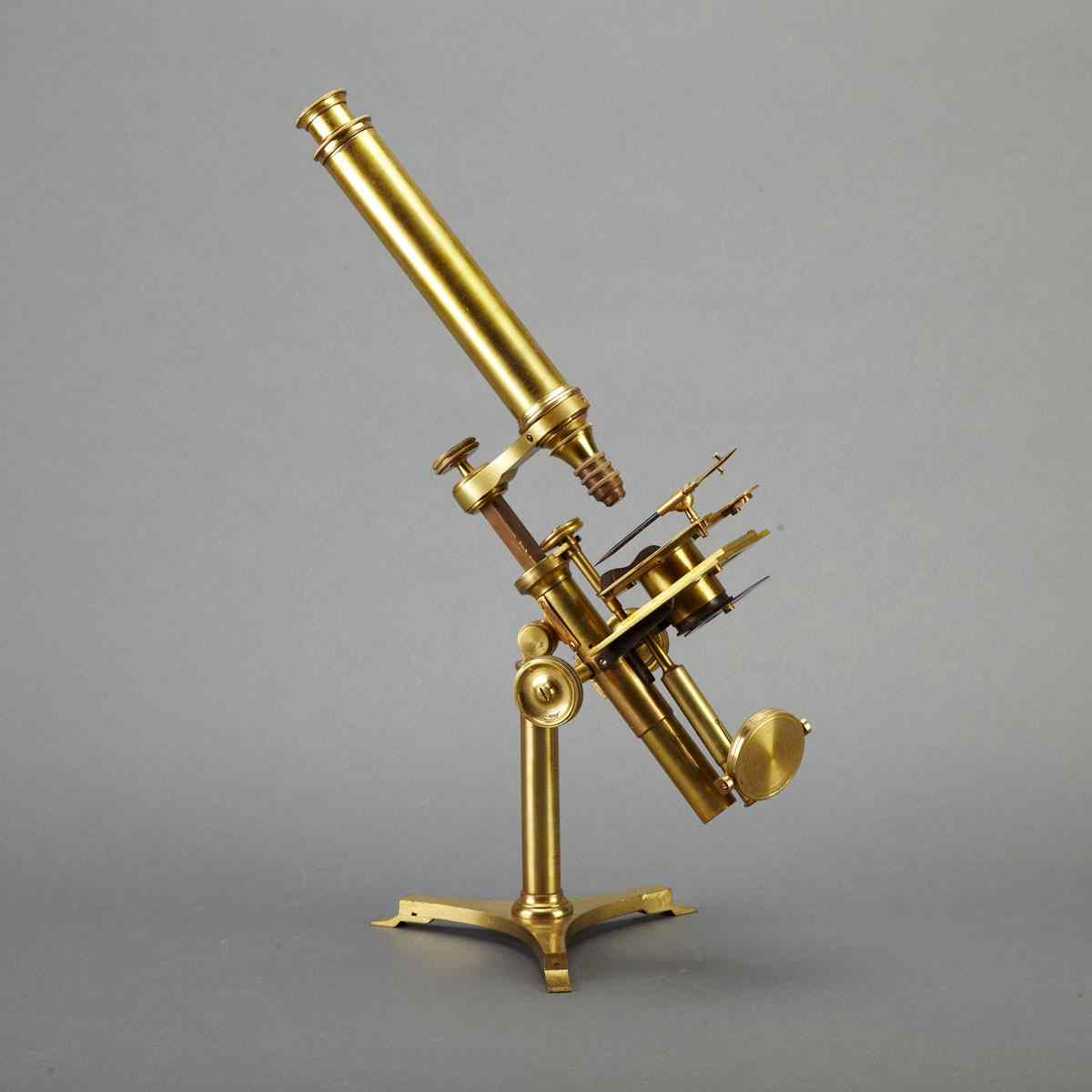 Appraisal: English Lacquered Brass Transitional Microscope early th century with rack