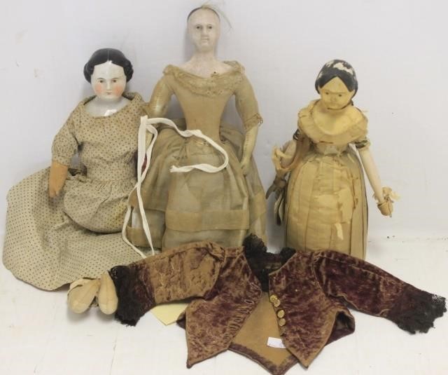 Appraisal: THREE TH C DOLLS ONE IS WITH PORCELAINHEAD AND SHOULDERS