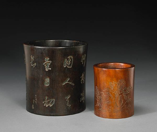 Appraisal: A zitan and a huanghuali brush pot Qing Dynasty Republic