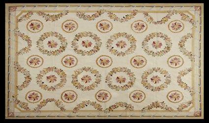 Appraisal: AUBUSSON CARPET The ivory field worked with alternating floral wreaths