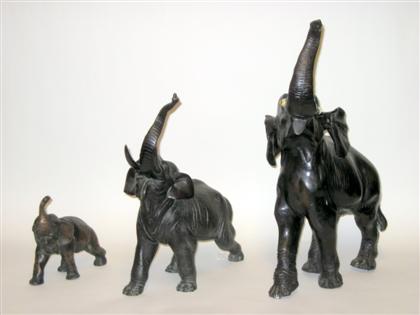 Appraisal: Two Japanese bronze figures of elephantsBrown patina naturalistically modeled together