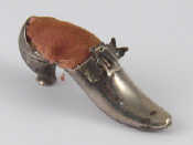 Appraisal: A silver pincushion in the form of a lady's shoe