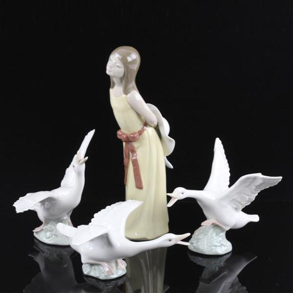 Appraisal: FOUR LLADRO PORCELAIN FIGURINES GIRL HOLDING HAT AND THREE GEESE