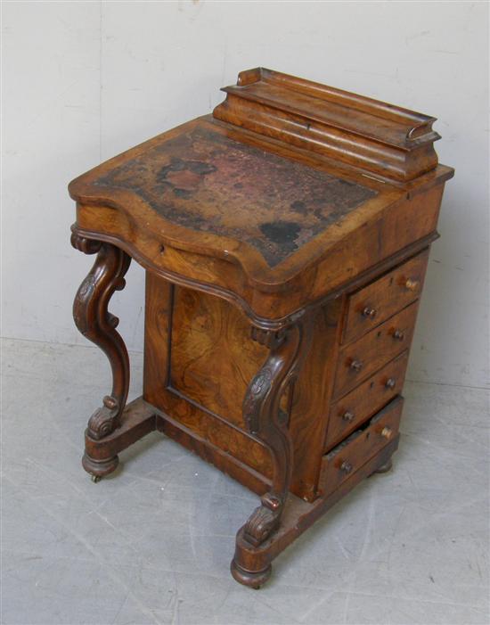 Appraisal: th century walnut serpentine fronted davenport h w d in