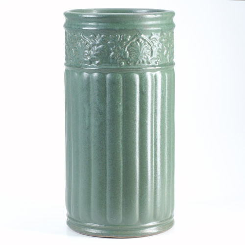 Appraisal: ROSEVILLE Matte green cylindrical umbrella stand with banded floral details