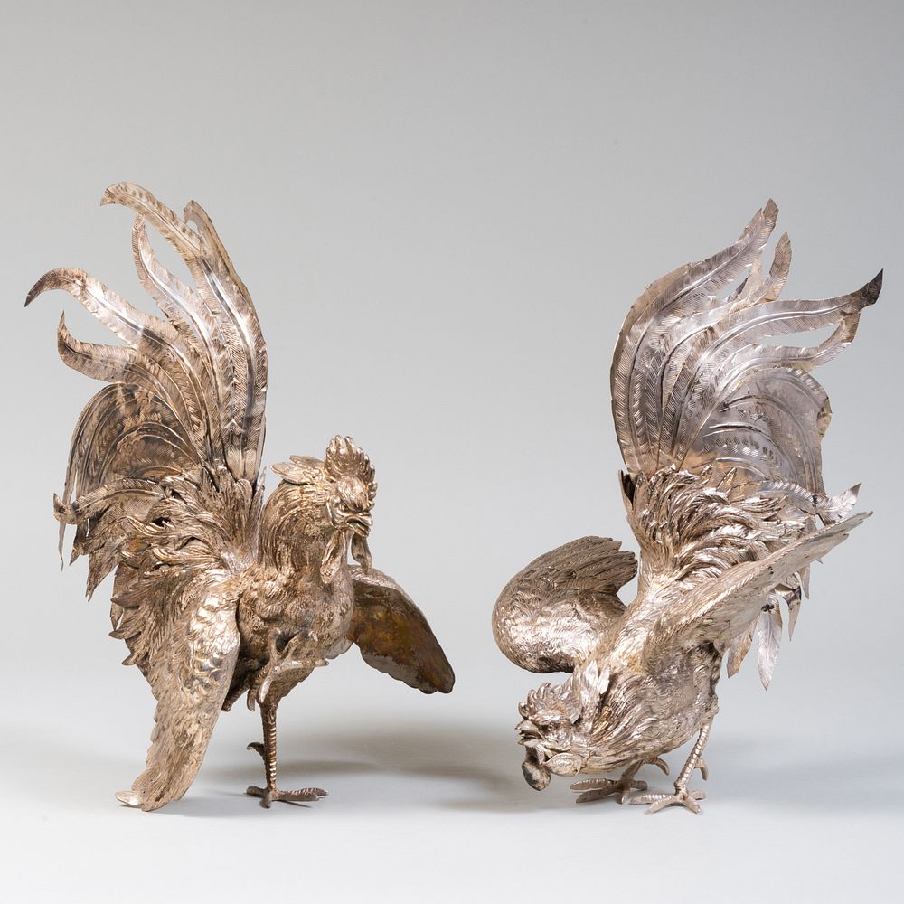 Appraisal: Large Pair of Silver Plate Fighting Roosters Unmarked The first