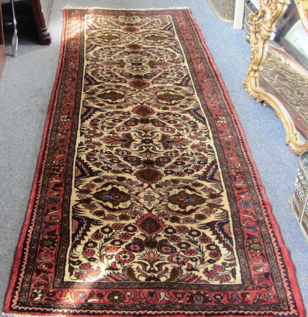 Appraisal: A Mahal runner Persian the ivory field with an allover