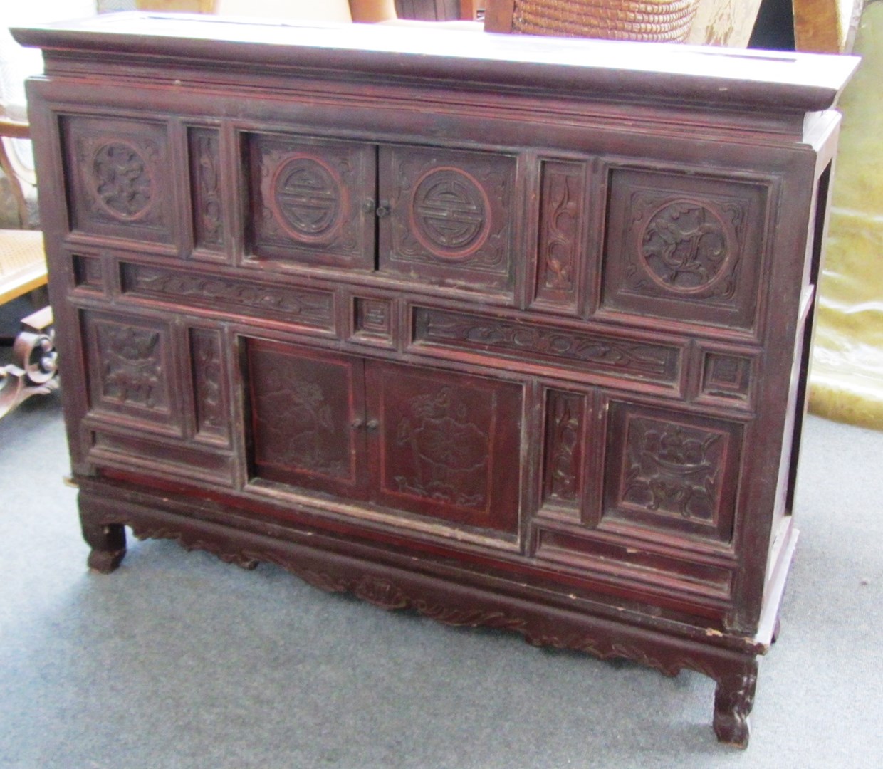 Appraisal: A late th century Chinese red lacquer double height side