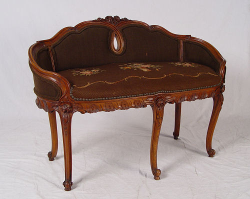 Appraisal: PETITE CARVED FRENCH SETTEE WITH NEEDLEPOINT SEAT AND BACK Measures