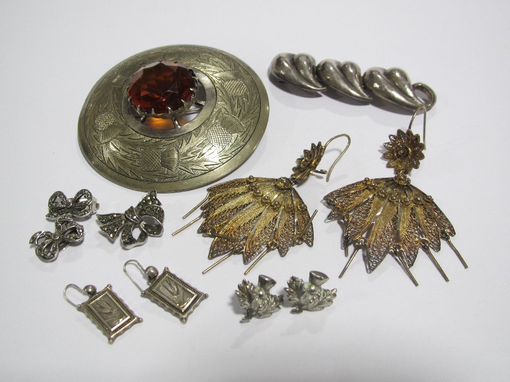 Appraisal: Lot comprising a white metal Cairngorm set plaid brooch and