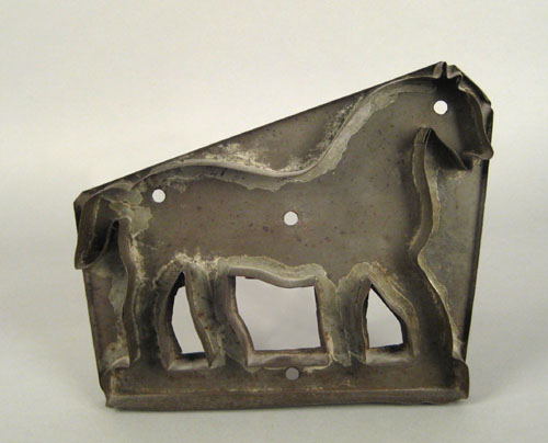 Appraisal: Large tinned sheet iron horse cookie cutter th c h