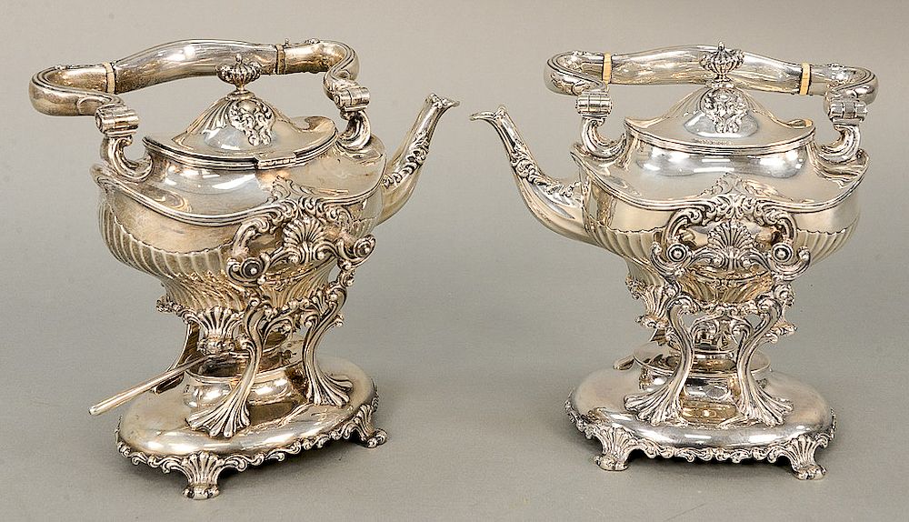 Appraisal: Pair of sterling silver tilting pots on stands one marked