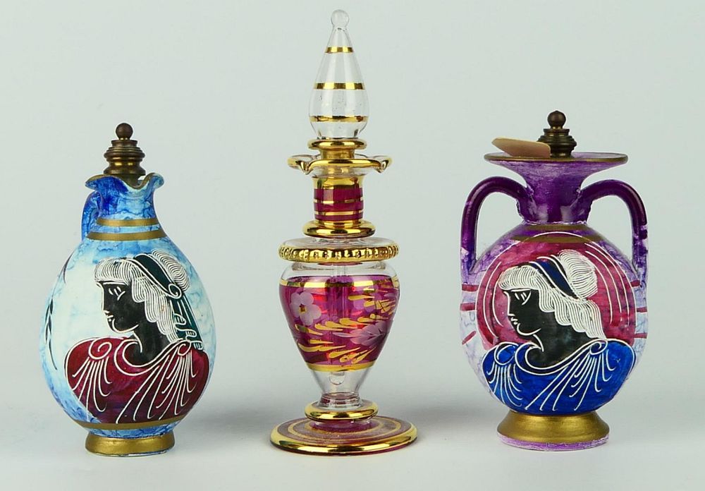 Appraisal: VINTAGE ITALIAN GLASS POTTERY SCENT BOTTLES A lot of vintage