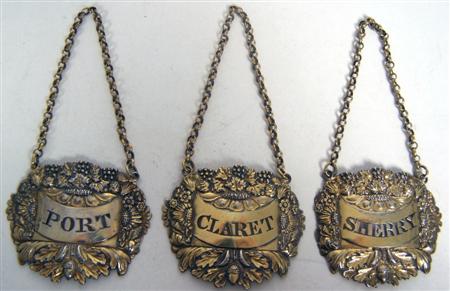 Appraisal: A set of three George III silver gilt wine labels