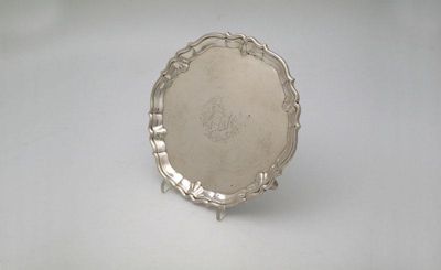 Appraisal: A George II silver waiter by Richard Rugg London circular