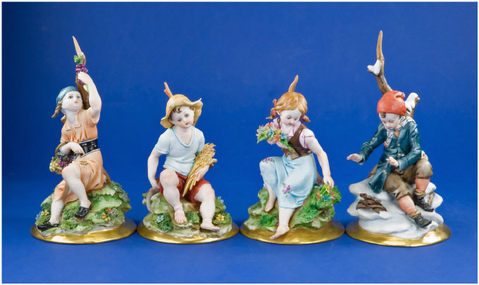 Appraisal: Four Capo-di-Monte Figures Marked to base