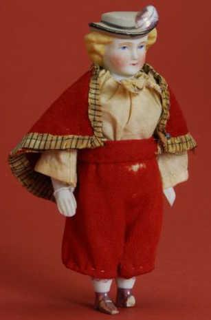 Appraisal: Squeak Toy Boy with Luster Boots Germany ca a very