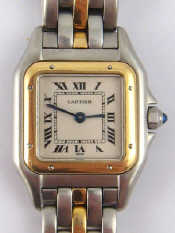 Appraisal: A lady's Cartier Panthere stainless steel and gold wristwatch with