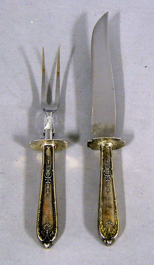 Appraisal: Large group of silver gripped flatware and serving utensils to